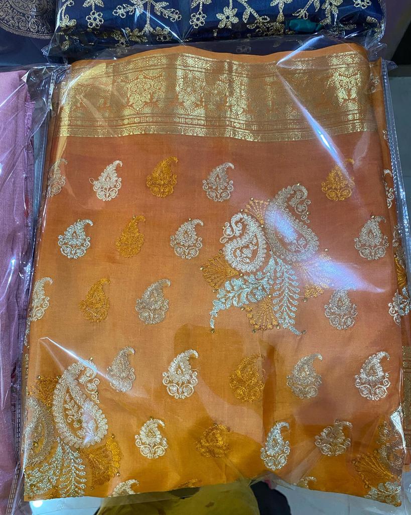 Pale sandal yellow silk linen saree with embroidery